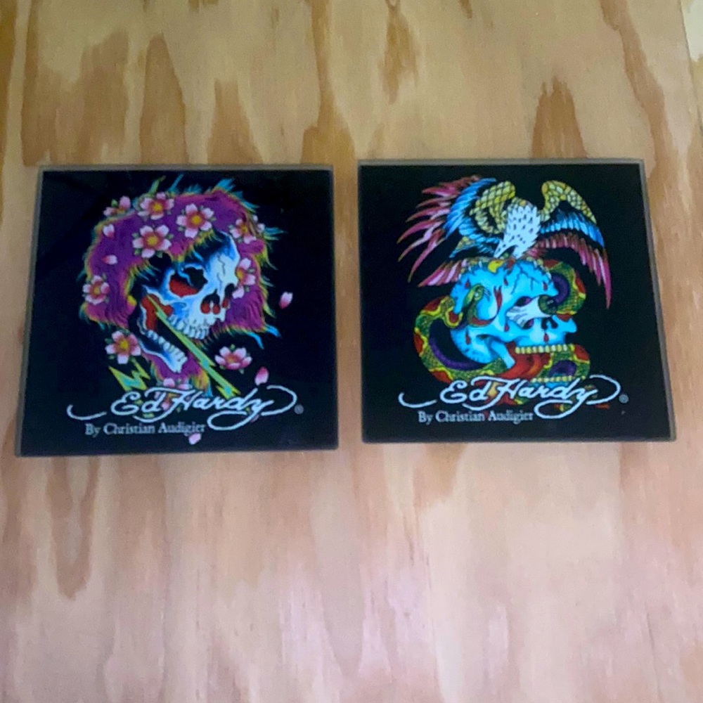 Two Ed Hardy black glass coasters